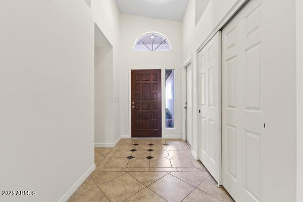 5450 E Paradise Ln, Scottsdale, AZ 85254 - entrance foyer with light tile patterned flooring and baseboards