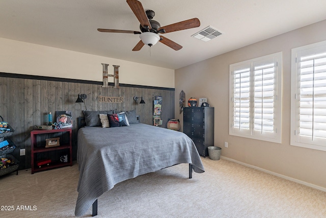 12238 W Patrick Ct, Sun City, AZ 85373 - carpeted bedroom with multiple windows, ceiling fan, and baseboards