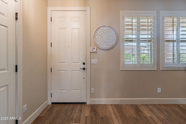 12238 W Patrick Ct, Sun City, AZ 85373 - entryway featuring wood finished floors, baseboards, and healthy amount of natural light