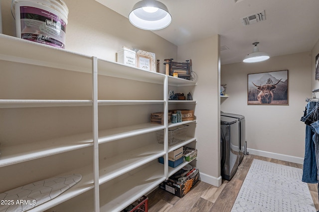 12238 W Patrick Ct, Sun City, AZ 85373 - storage area featuring washing machine and clothes dryer