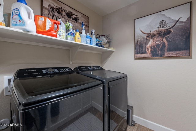 12238 W Patrick Ct, Sun City, AZ 85373 - laundry area with washer and dryer, wood finished floors, and baseboards