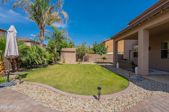 12238 W Patrick Ct, Sun City, AZ 85373 - view of yard with a patio area, an outdoor structure, and a storage shed