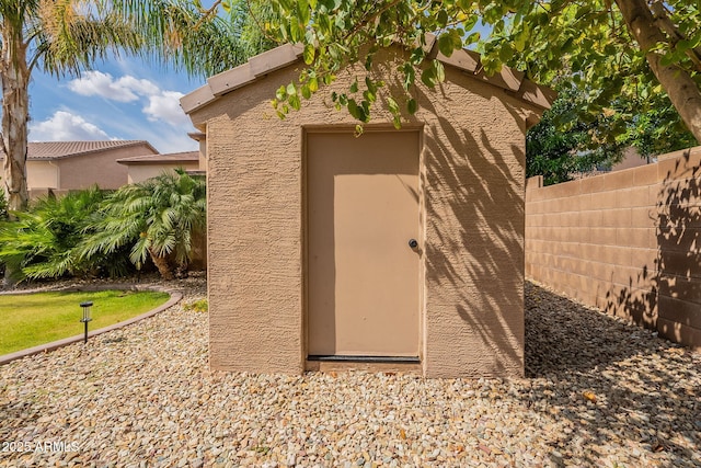 12238 W Patrick Ct, Sun City, AZ 85373 - view of shed featuring fence