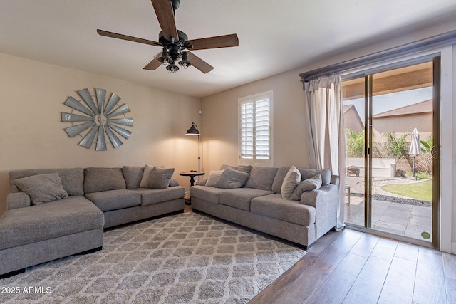 12238 W Patrick Ct, Sun City, AZ 85373 - living area with wood finished floors and ceiling fan