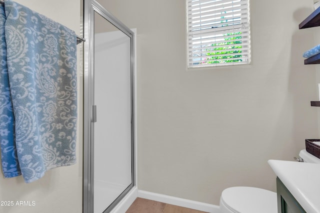 3029 E Patrick St, Gilbert, AZ 85295 - bathroom featuring toilet, a shower stall, baseboards, and vanity