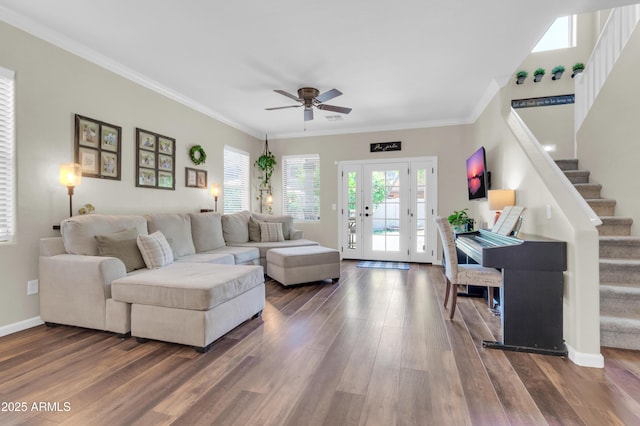 3029 E Patrick St, Gilbert, AZ 85295 - living room featuring dark wood finished floors, ceiling fan, stairs, baseboards, and crown molding