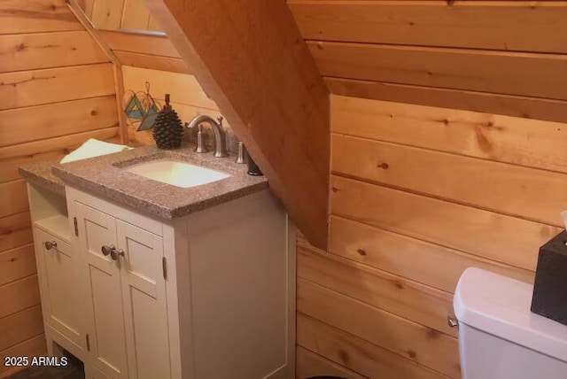 403 W Sherwood Dr, Payson, AZ 85541 - bathroom with toilet, wood walls, and vanity