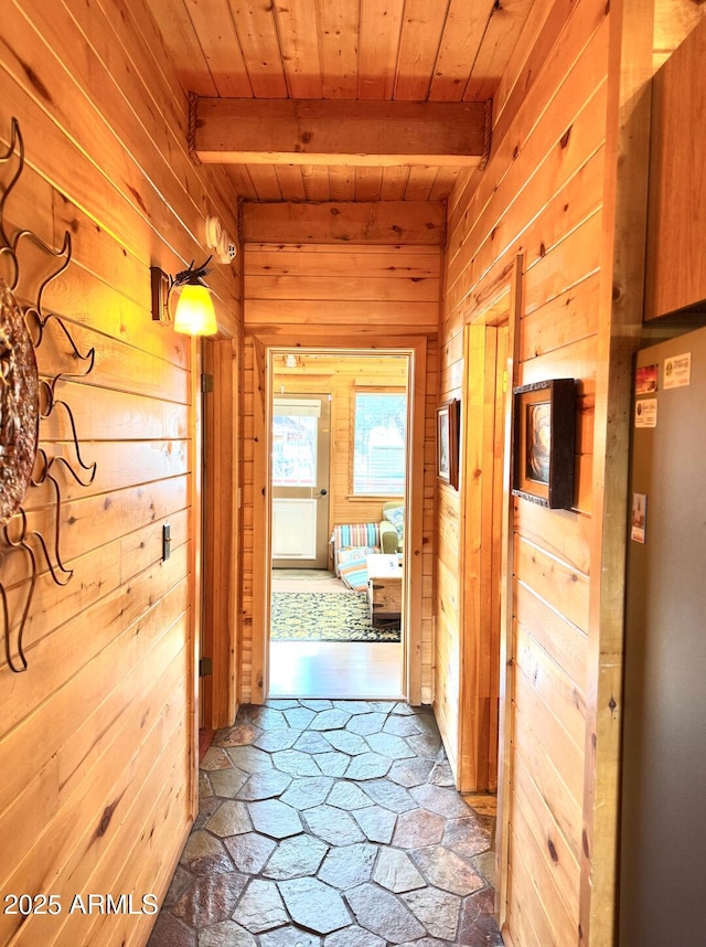 403 W Sherwood Dr, Payson, AZ 85541 - hall featuring wood ceiling, stone tile flooring, wood walls, and beamed ceiling