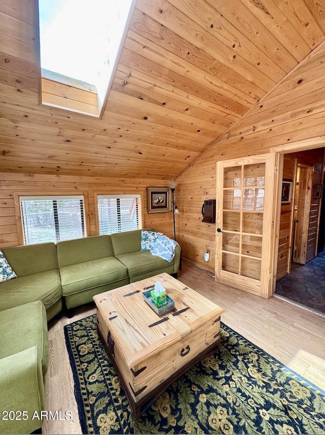 403 W Sherwood Dr, Payson, AZ 85541 - living room with wooden ceiling, wood walls, vaulted ceiling with skylight, and wood finished floors