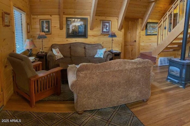 403 W Sherwood Dr, Payson, AZ 85541 - living room featuring wood finished floors, wooden ceiling, wooden walls, and a wood stove