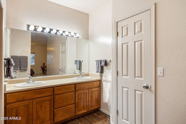 6523 Wild Cat Way, Pinetop, AZ 85935 - full bath with double vanity, a textured wall, and wood finished floors