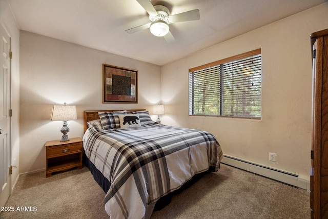 6523 Wild Cat Way, Pinetop, AZ 85935 - bedroom featuring baseboard heating, carpet flooring, baseboards, and ceiling fan