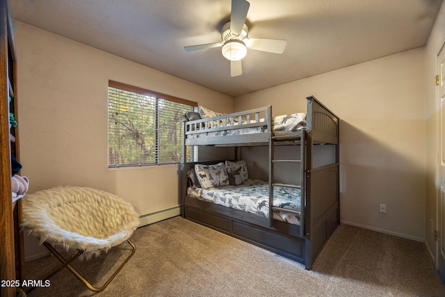 6523 Wild Cat Way, Pinetop, AZ 85935 - bedroom with carpet flooring, a baseboard radiator, ceiling fan, and baseboards