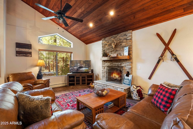 6523 Wild Cat Way, Pinetop, AZ 85935 - living area with wood finished floors, wood ceiling, a fireplace, a ceiling fan, and baseboard heating