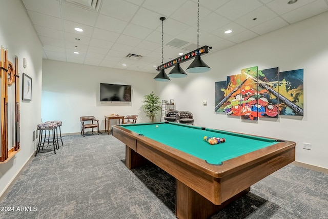 rec room featuring a paneled ceiling, dark carpet, and billiards