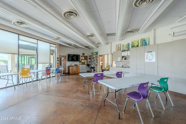 dining space with concrete floors