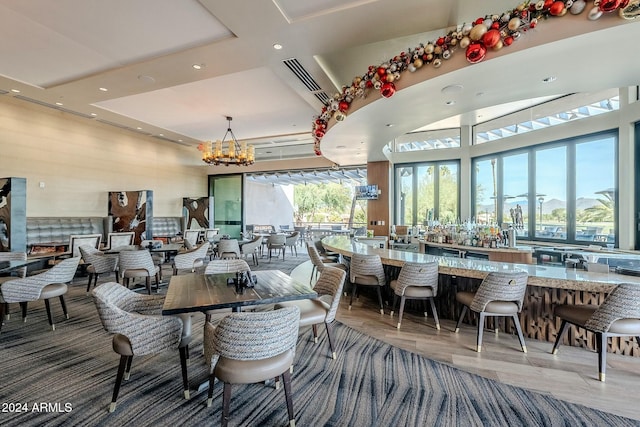 dining space with a chandelier