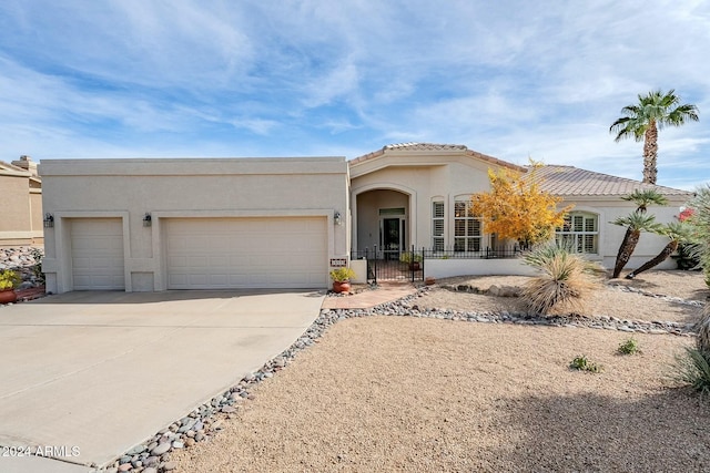 view of front of home featuring a garage