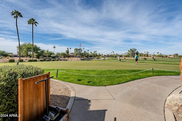 view of home's community featuring a lawn