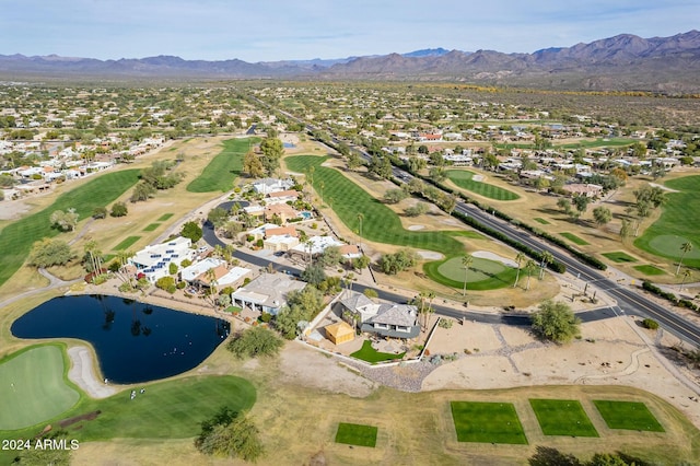 bird's eye view with a water and mountain view