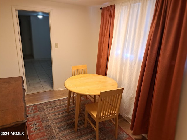 dining space featuring wood finished floors