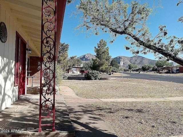 exterior space featuring a mountain view