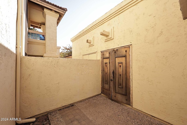 exterior space with stucco siding