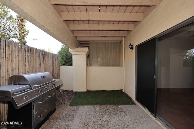 view of patio / terrace featuring fence and area for grilling