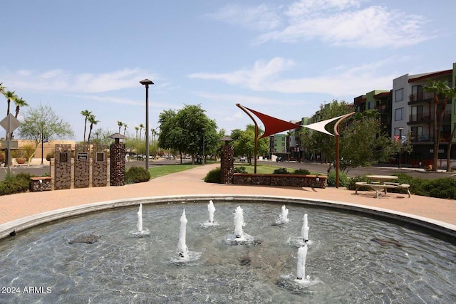 view of home's community featuring uncovered parking