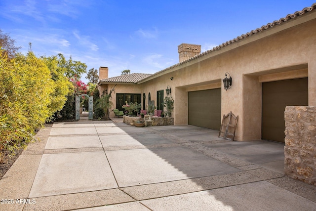 view of front of property featuring a garage