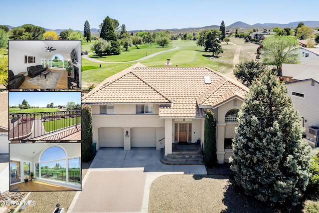 drone / aerial view featuring a mountain view and golf course view
