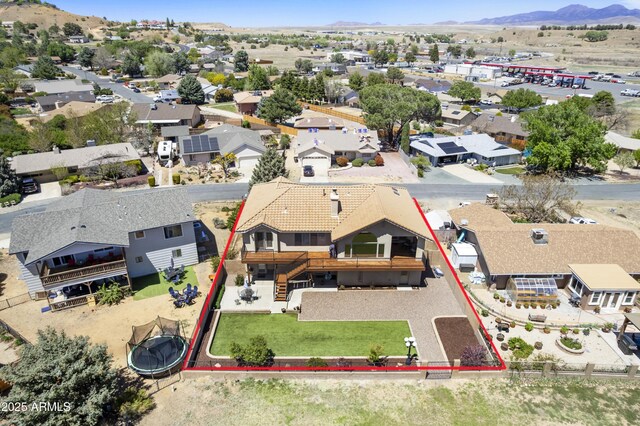drone / aerial view featuring a mountain view and a residential view