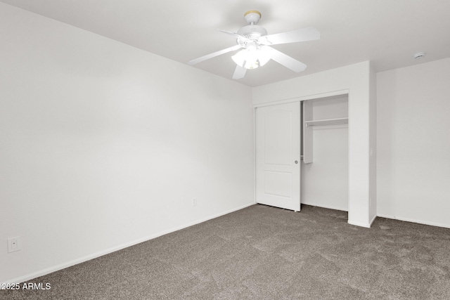 unfurnished bedroom with a closet, carpet flooring, baseboards, and ceiling fan