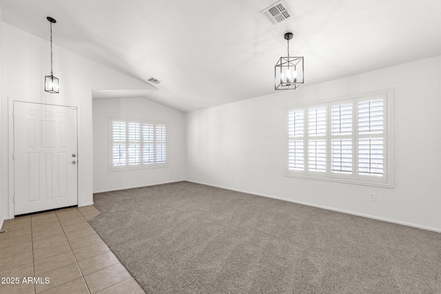 interior space with an inviting chandelier, visible vents, light carpet, and lofted ceiling