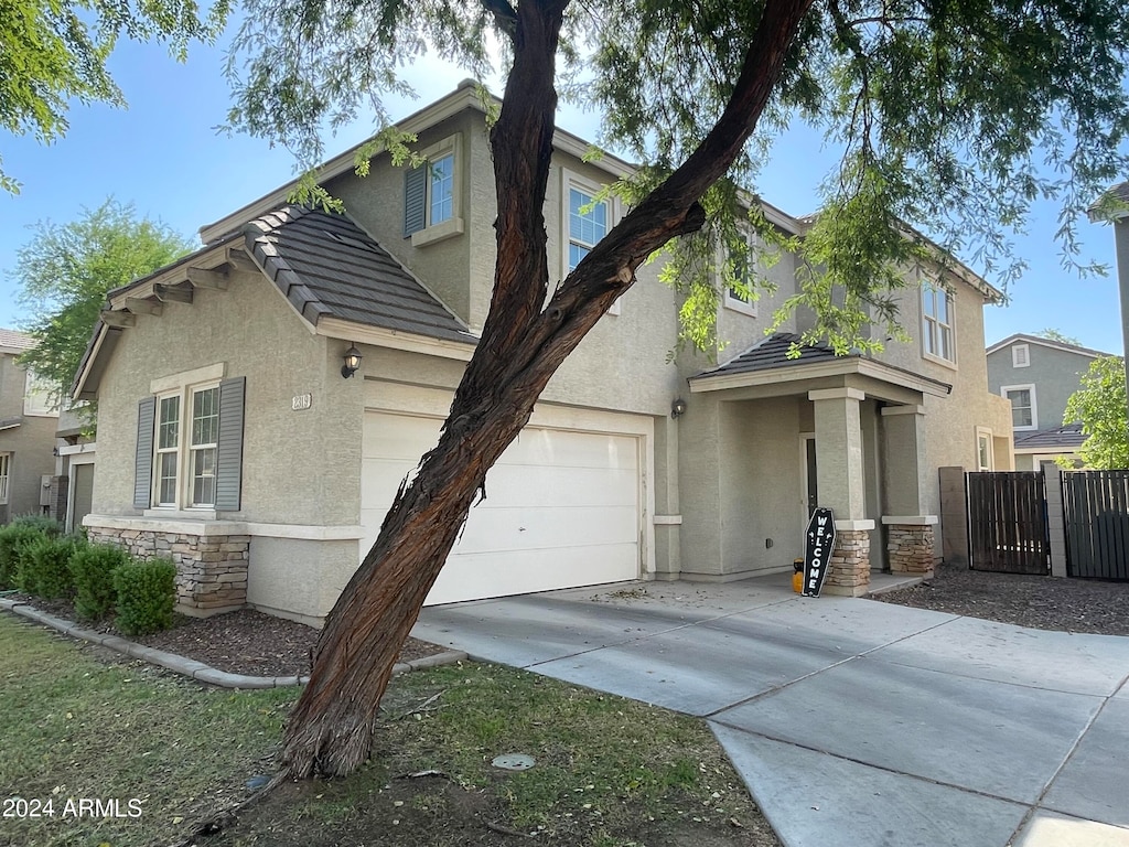 view of front of property featuring a garage