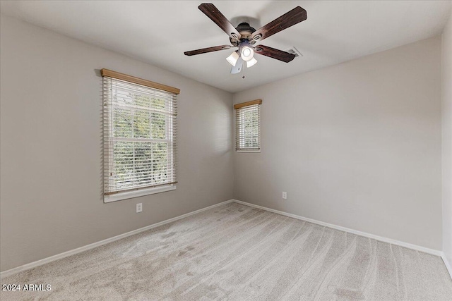 carpeted empty room with ceiling fan