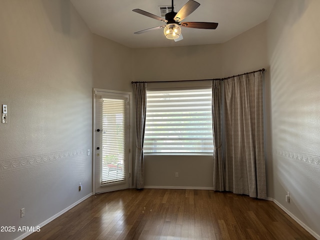 694 W Beechnut Dr, Chandler, AZ 85248 - empty room with ceiling fan and wood finished floors