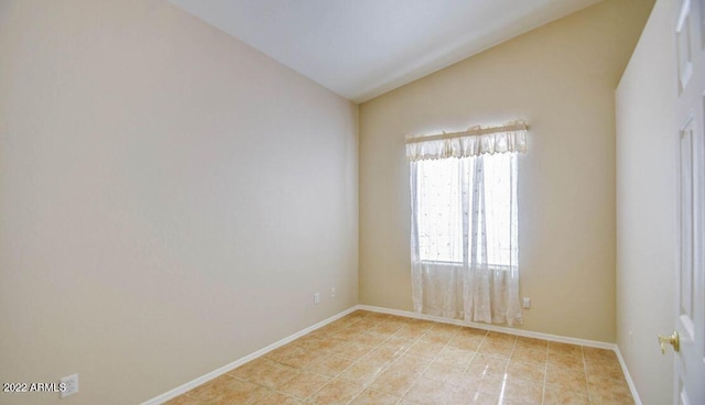 694 W Beechnut Dr, Chandler, AZ 85248 - empty room with vaulted ceiling and light tile patterned floors