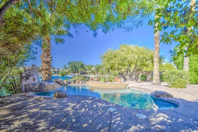 694 W Beechnut Dr, Chandler, AZ 85248 - outdoor pool with a patio area
