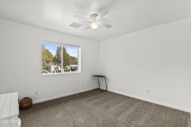 unfurnished room with carpet floors and ceiling fan