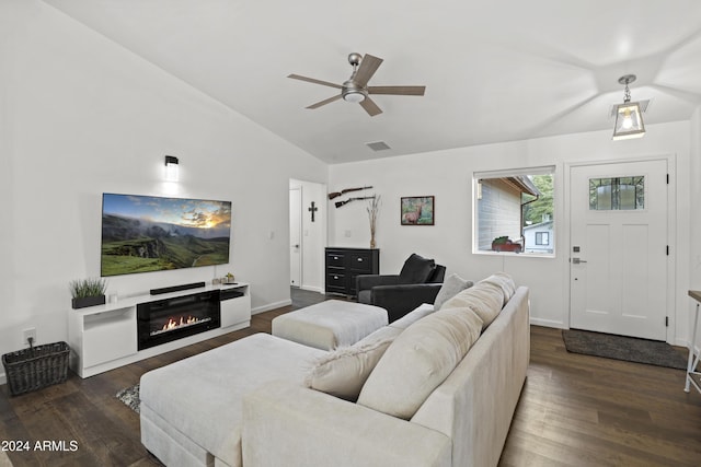 living room with lofted ceiling, dark hardwood / wood-style floors, and ceiling fan