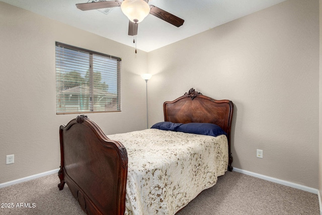 bedroom featuring carpet, ceiling fan, and baseboards