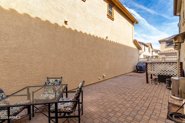 view of patio / terrace with fence and outdoor dining space