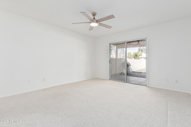 unfurnished room featuring carpet floors and ceiling fan