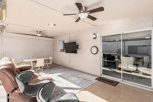 view of patio featuring ceiling fan