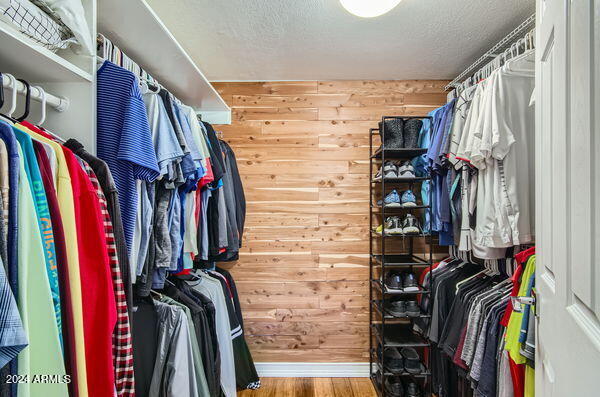 spacious closet featuring wood-type flooring