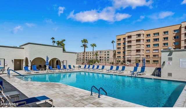 view of swimming pool featuring a patio