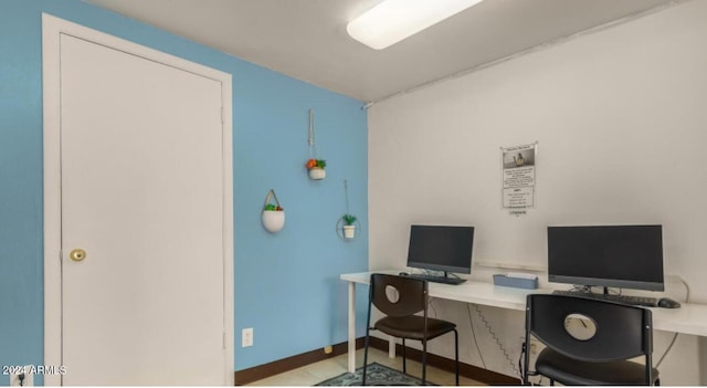 office space featuring light tile patterned floors