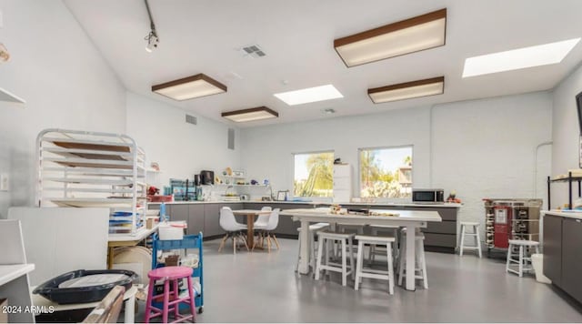 interior space with a breakfast bar area