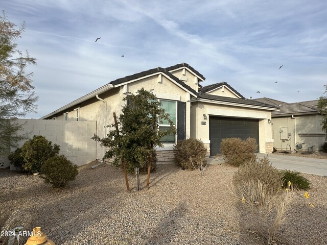 single story home with a garage